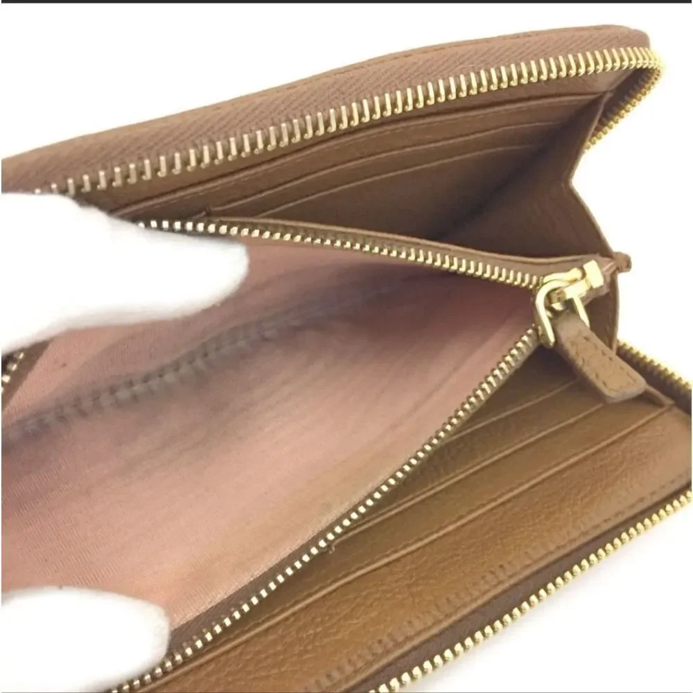 Authentic MIU MIU Ribbon Leather Zip Long Wallet/S2257. 194